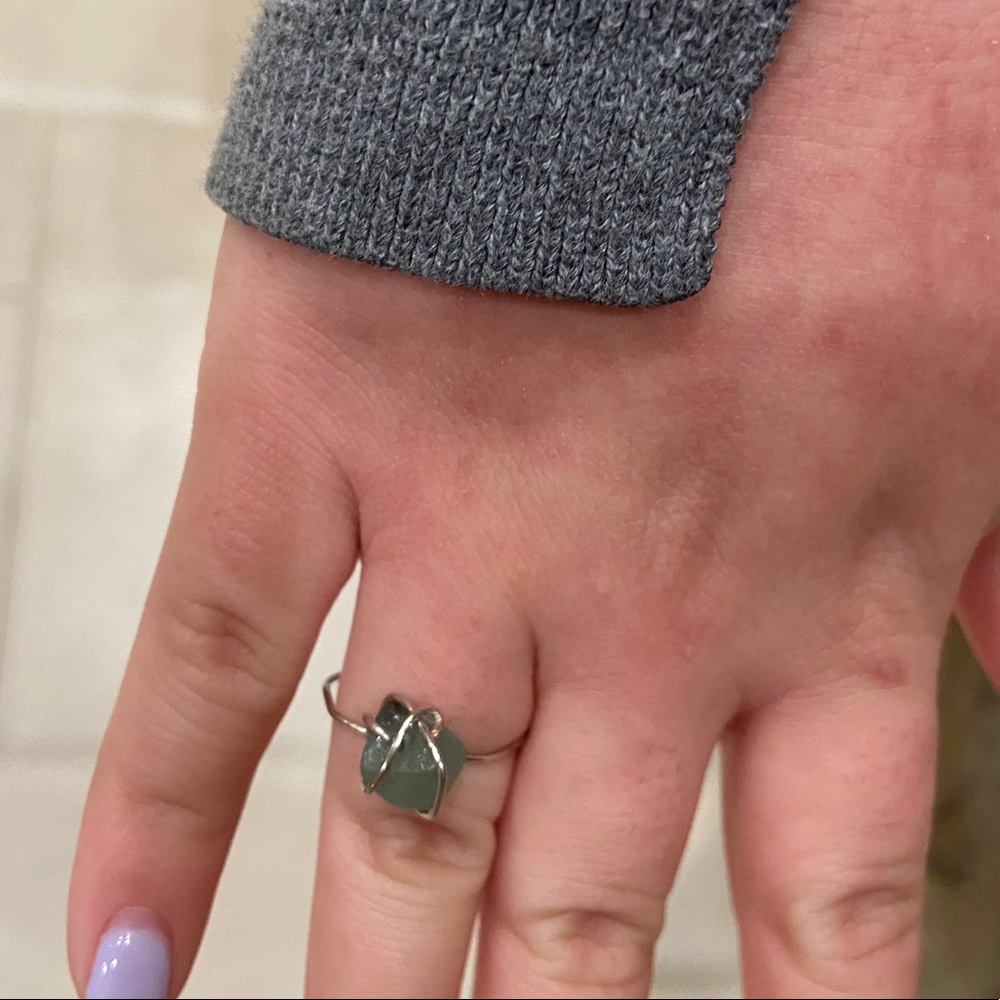green stone gold ring